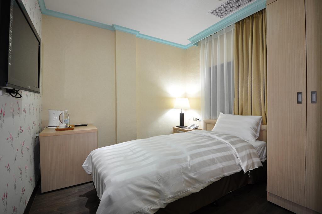A Casa Hotel Taoyuan Rom bilde