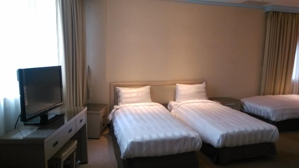 A Casa Hotel Taoyuan Rom bilde