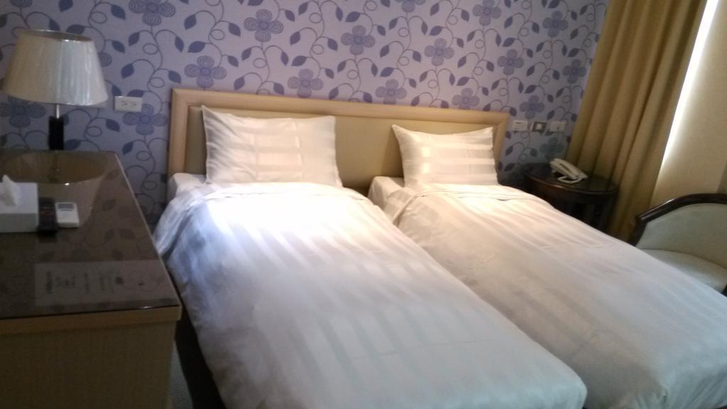 A Casa Hotel Taoyuan Rom bilde