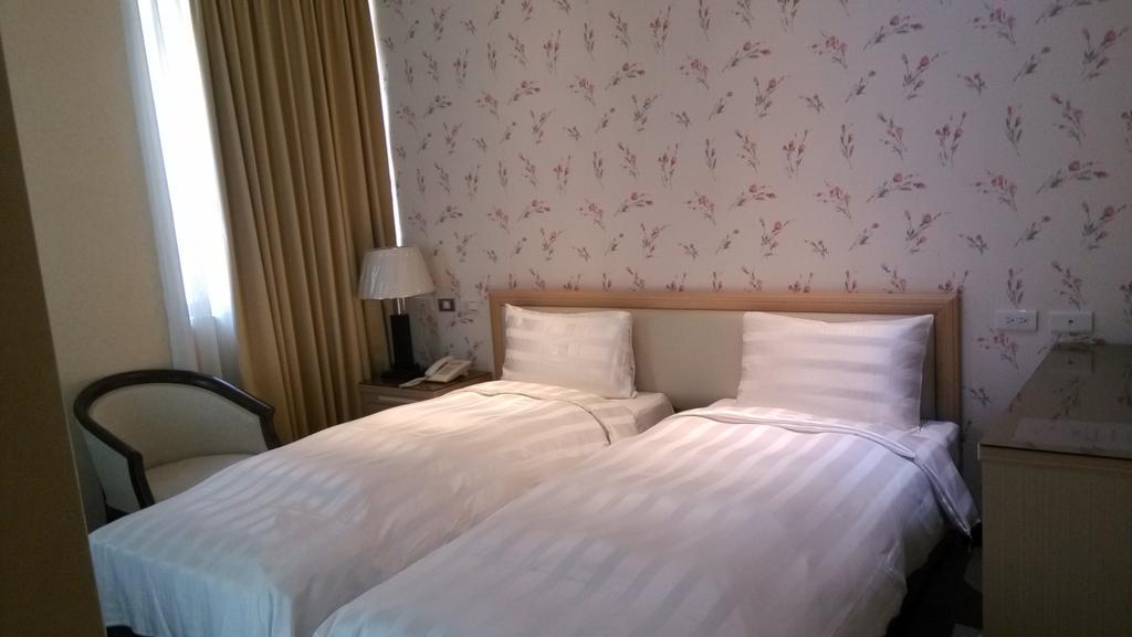 A Casa Hotel Taoyuan Rom bilde