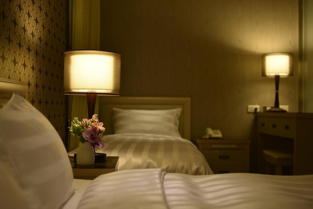 A Casa Hotel Taoyuan Rom bilde