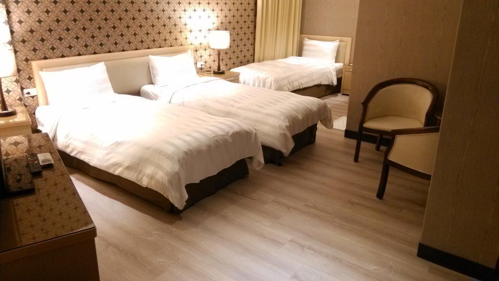 A Casa Hotel Taoyuan Rom bilde