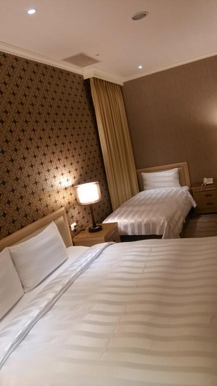 A Casa Hotel Taoyuan Rom bilde