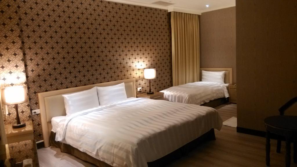 A Casa Hotel Taoyuan Rom bilde